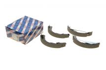 Комплект тормозных колодок (задних) VW Caddy II 95-04 (барабанные)