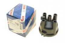 Кришка розподільника запалювання Hyundai H100/Sonata/Mitsubishi Colt/Lancer Mazda 323/626 74-97 Кришка розподільника запалювання Hyundai H100/Sonata/Mitsubishi Colt/Lancer Mazda 323/626 74-97