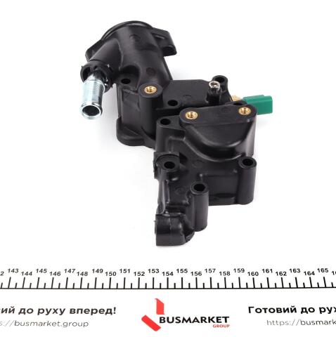 Корпус термостата Citroen Berlingo/Peugeot Partner 1.1-1.6i 96- (+ датчик) Корпус термостата Citroen Berlingo/Peugeot Partner 1.1-1.6i 96- (+ датчик)