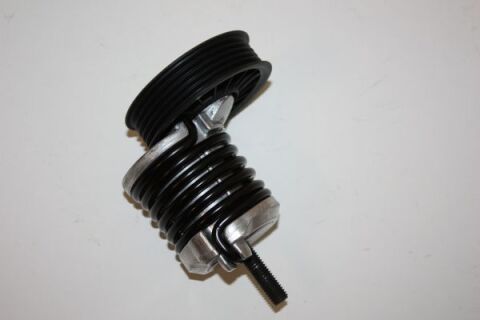 Натяжний пристрій, клиновий ремінь