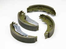 Гальмівні колодки задні MB 207-210 (з накладками)