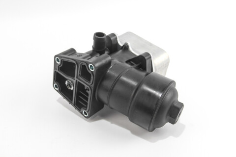 Корпус масляного фильтра VW Caddy III/Crafter/T5 1.6TDI/2.0TDI 09- (з теплообменником) Корпус масляного фильтра VW Caddy III/Crafter/T5 1.6TDI/2.0TDI 09- (з теплообменником)