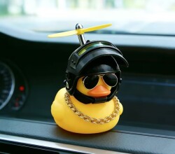 Уточка-мотоциклист в шлеме - Фигурка на приборную панель Уточка-мотоциклист в шлеме - Фигурка на приборную панель