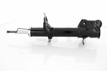 Амортизатор задний Mazda 323 98- Л. (газ.)